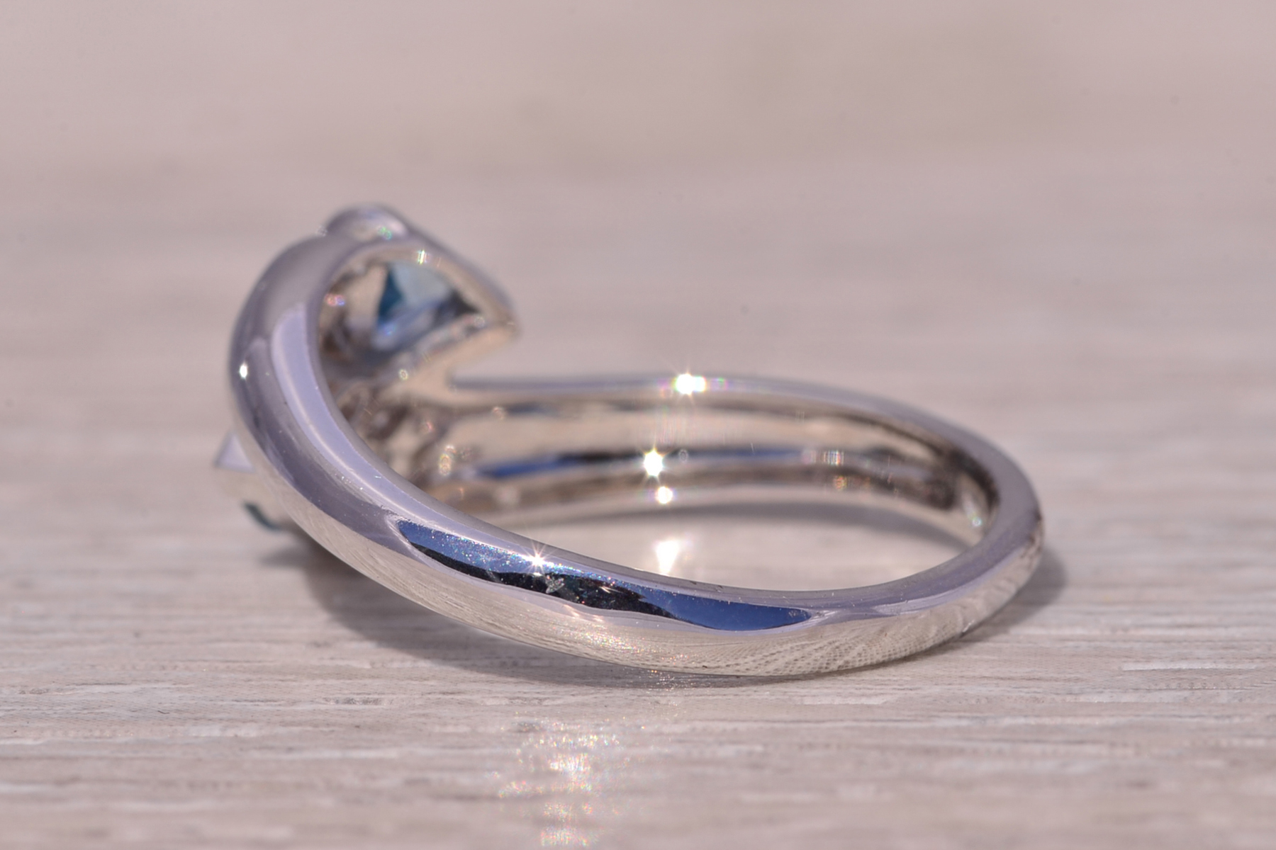 The Ocean's Embrace: Aquamarine and Diamond Bypass Ring in White Gold - Image 4