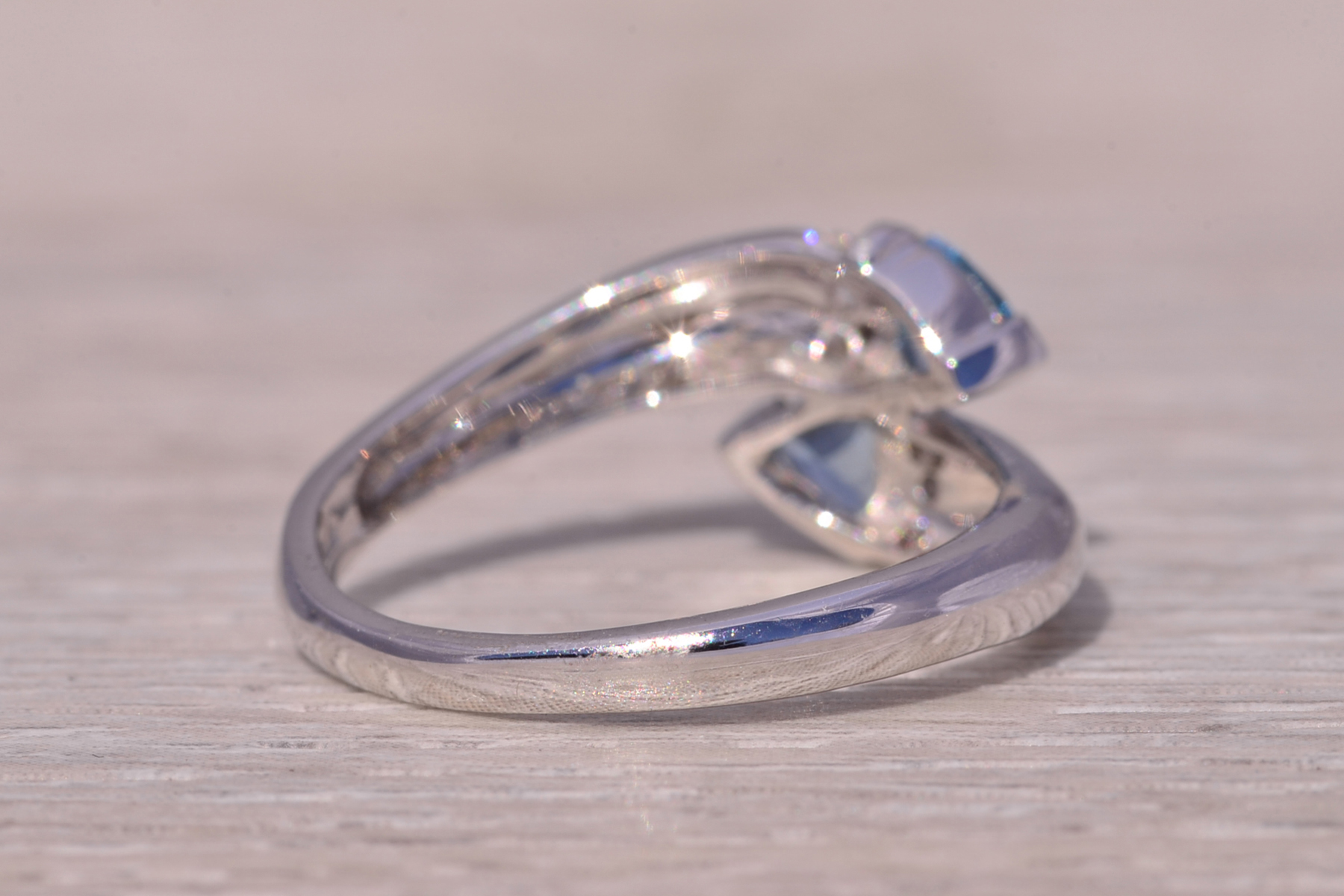 The Ocean's Embrace: Aquamarine and Diamond Bypass Ring in White Gold - Image 5