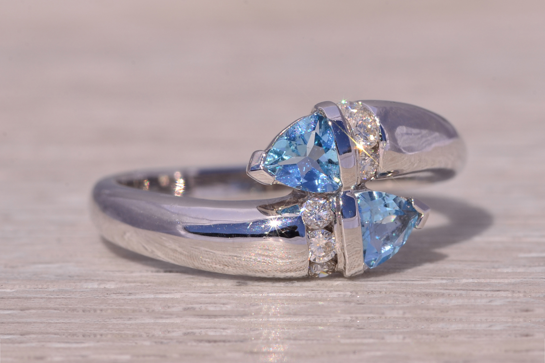 The Ocean's Embrace: Aquamarine and Diamond Bypass Ring in White Gold - Image 6