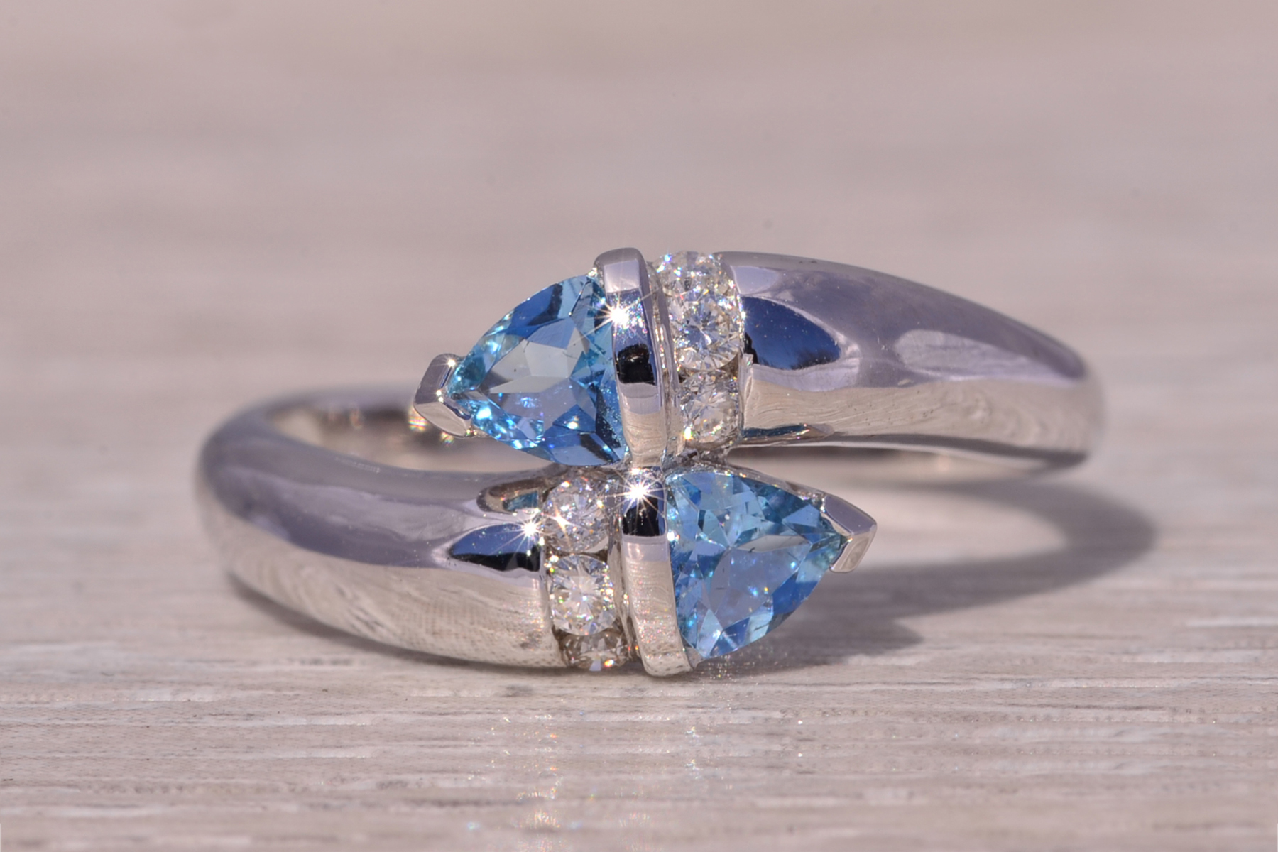 The Ocean's Embrace: Aquamarine and Diamond Bypass Ring in White Gold - Image 7
