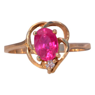 The Heart's Embrace: Ruby and Diamond Ring in 14 Karat Yellow Gold
