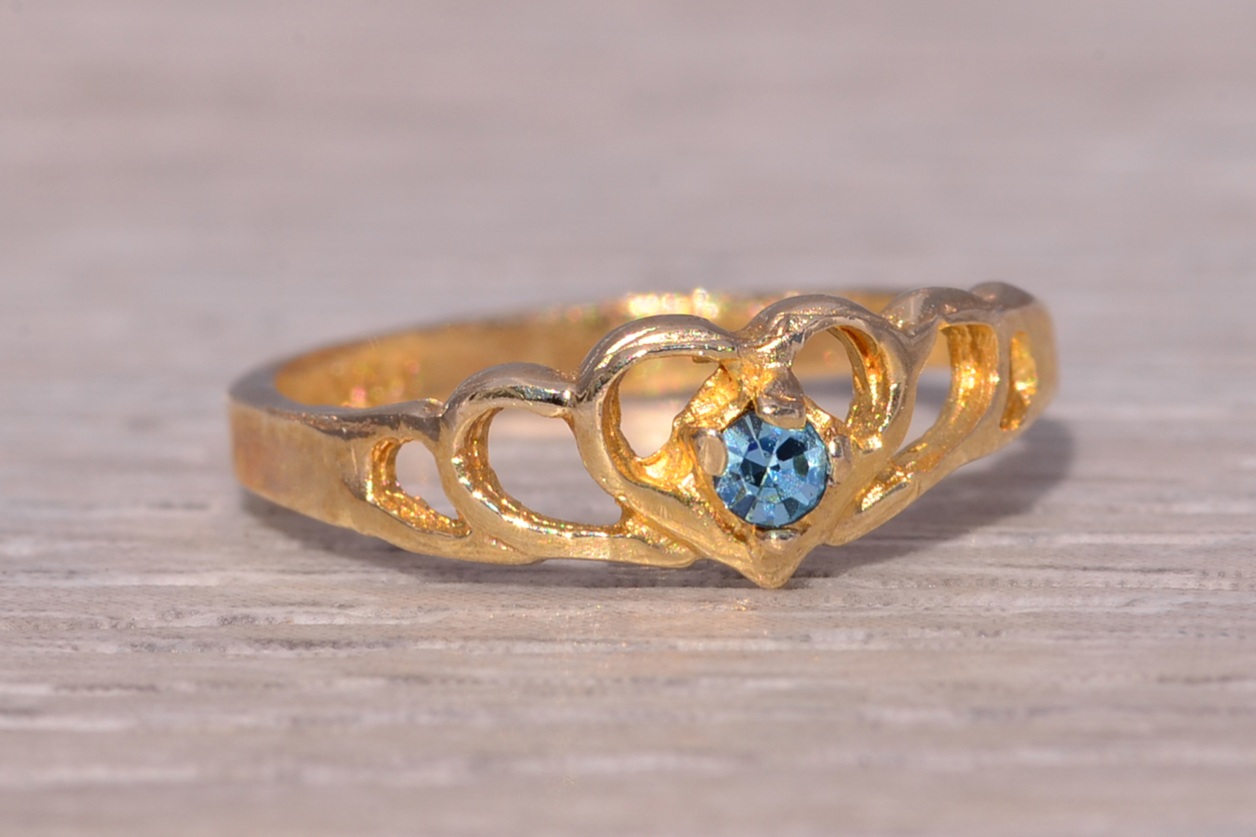 The Little Heart: Child's Blue Crystal Ring in Yellow Gold - Image 6