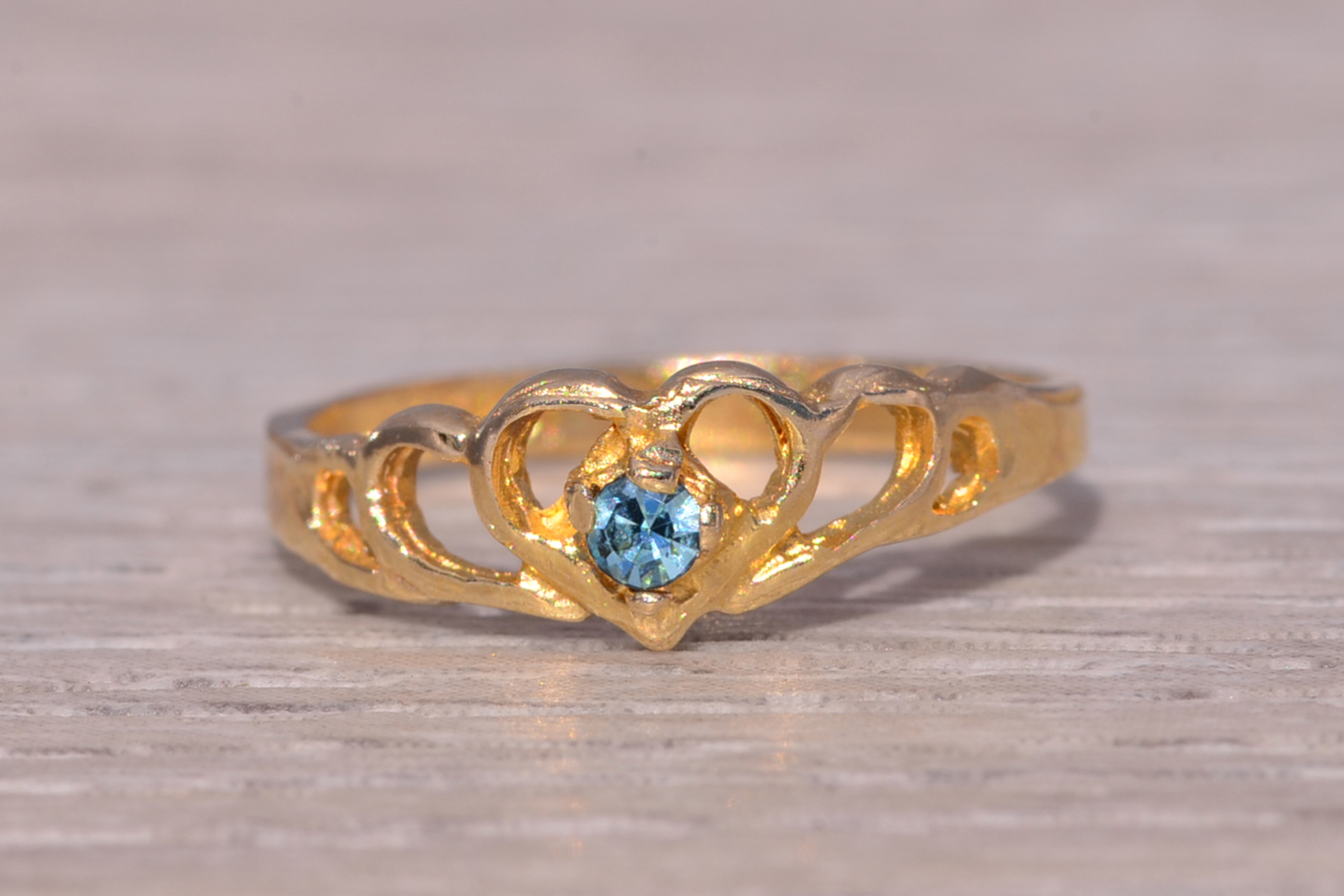 The Little Heart: Child's Blue Crystal Ring in Yellow Gold - Image 7