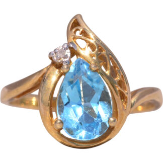 The Blue Flame: Vivid Swiss Blue Topaz and Natural Diamond Ring in Yellow Gold