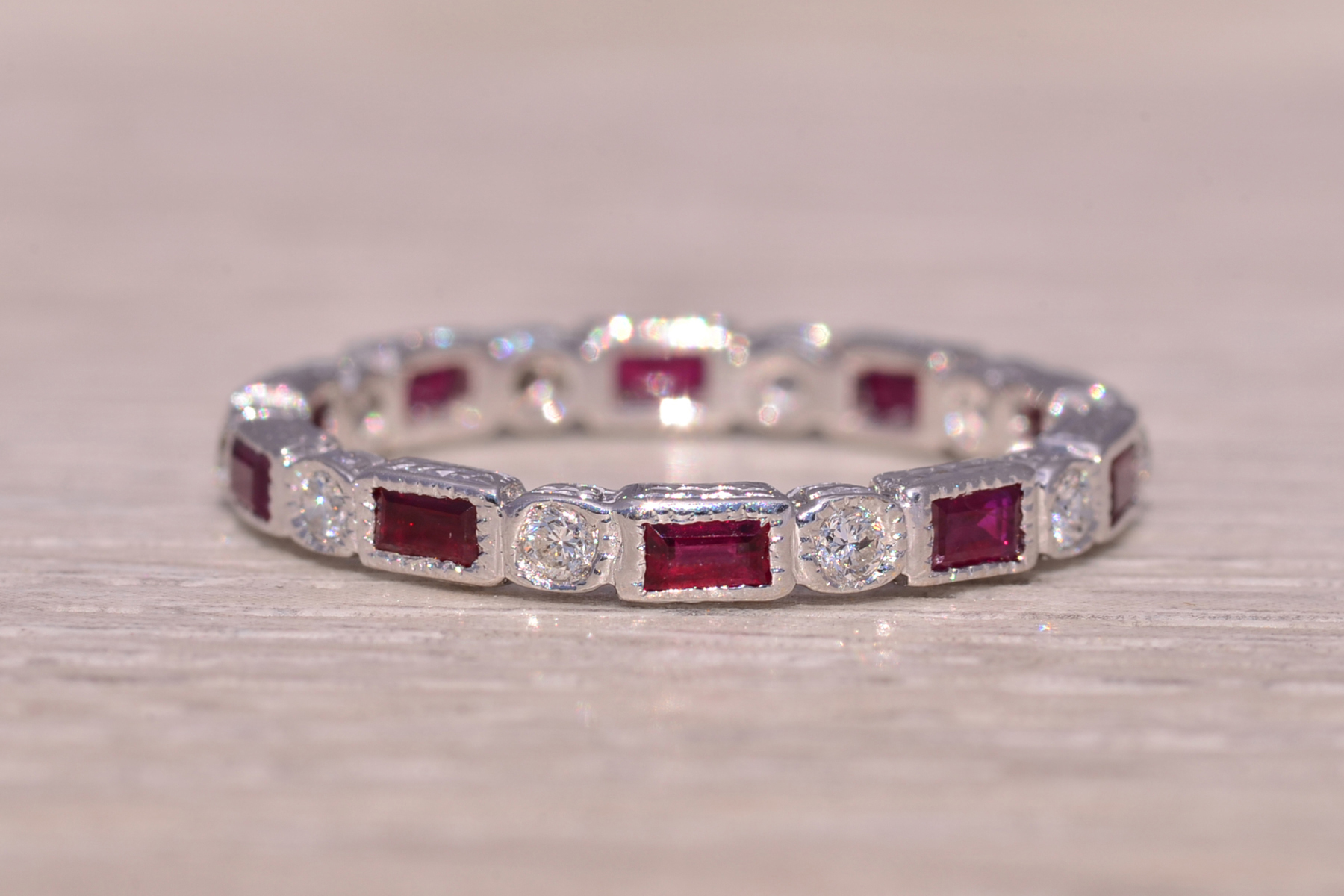 SOLD - The Scarlet Spark: Ruby and Natural Diamond Eternity Band in White Gold - Image 2