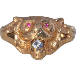 The Regal Guardian: Diamond and Ruby Lion Ring in Yellow Gold