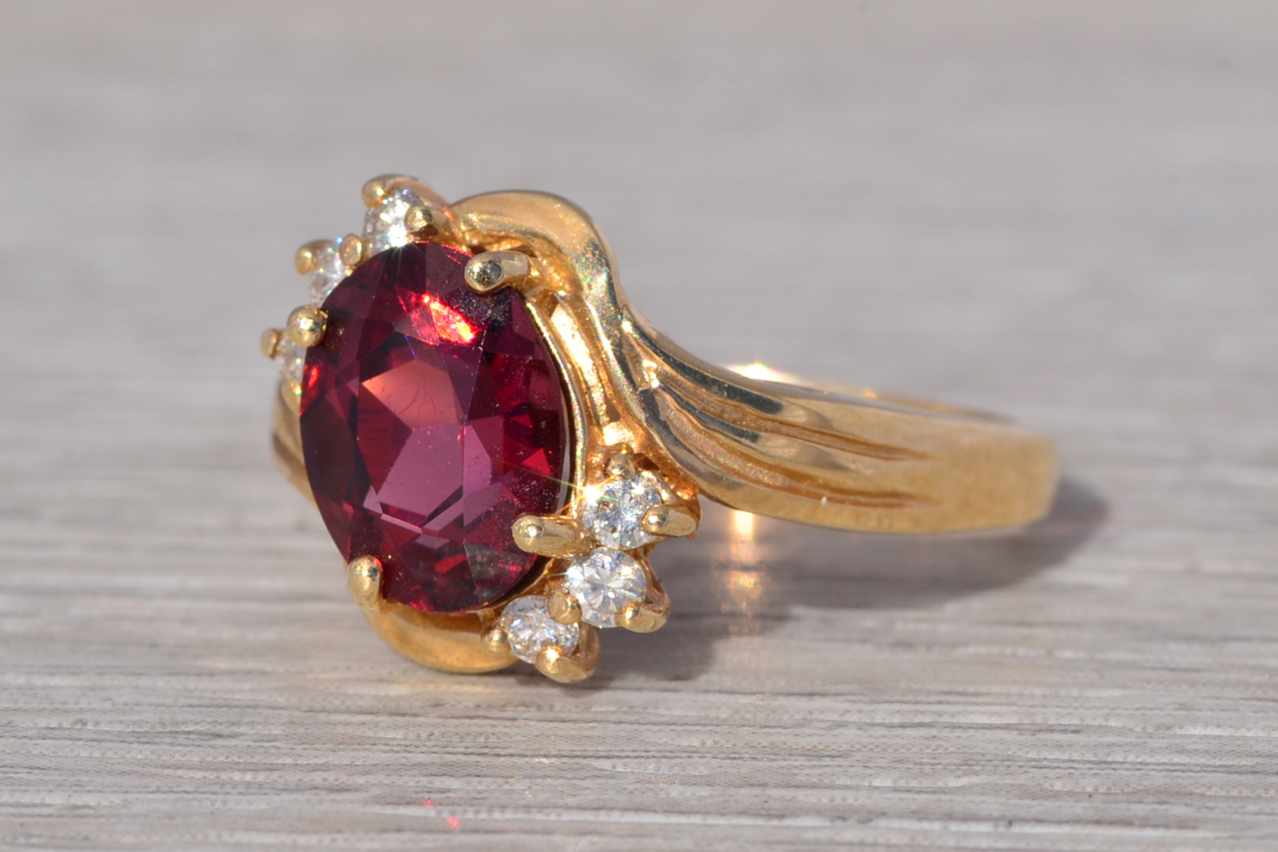 The Ember: Garnet and Diamond Ring in Yellow Gold - Image 3