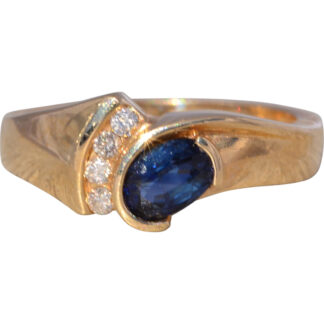 The Midnight Arc: Sapphire and Diamond Ring in Yellow Gold