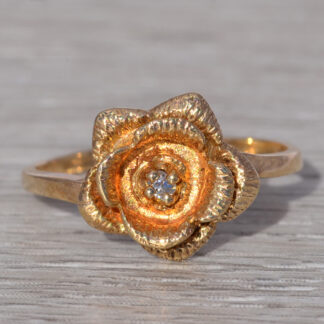 The Golden Bloom: Diamond Floral Ring in Yellow Gold