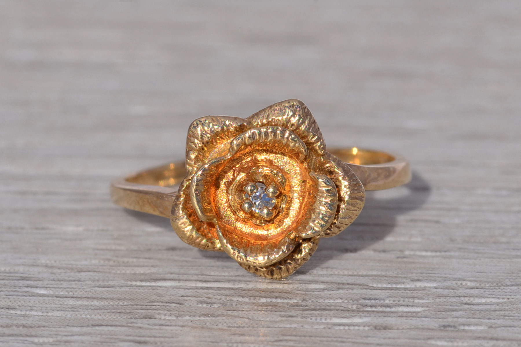 The Golden Bloom: Diamond Floral Ring in Yellow Gold