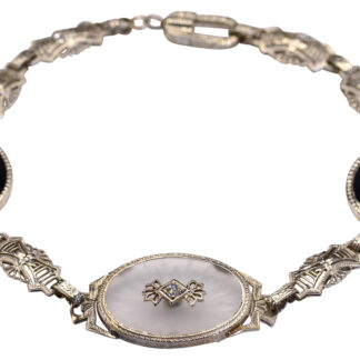 The 48th Street:  Antique Art Deco Camphor Glass Bracelet set with Diamonds and Onyx