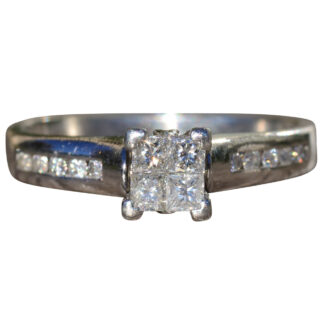 The Mancelona Village:  Ladies Platinum Engagement Ring set with Princess Cut Diamonds