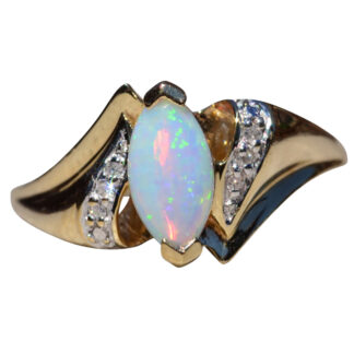 The Cortez:  Navette Opal and Diamond Ring in Yellow Gold