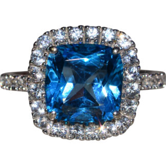 Blue and White Topaz Ring in White Gold