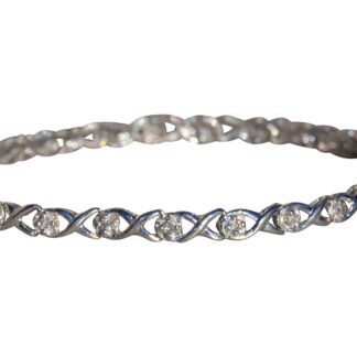 SOLD - The Cultus Lake:  Ladies White Gold and Diamond XO Bracelet