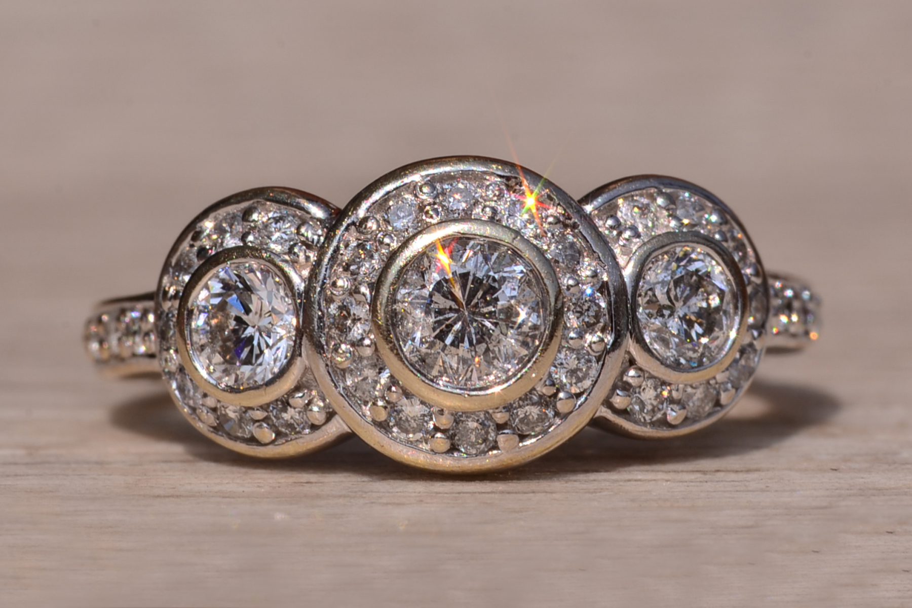 The Coast Road: Three Stone Halo Ring set with Natural Diamonds - Image 2