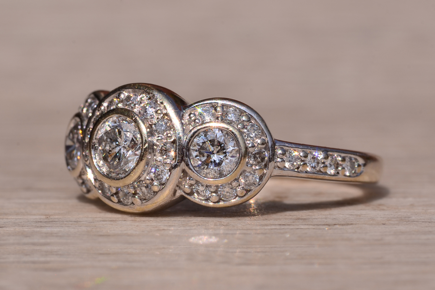 The Coast Road: Three Stone Halo Ring set with Natural Diamonds - Image 3