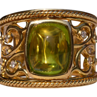 The Startop Drive: Peridot Cabochon Ring with Filigree and Diamonds