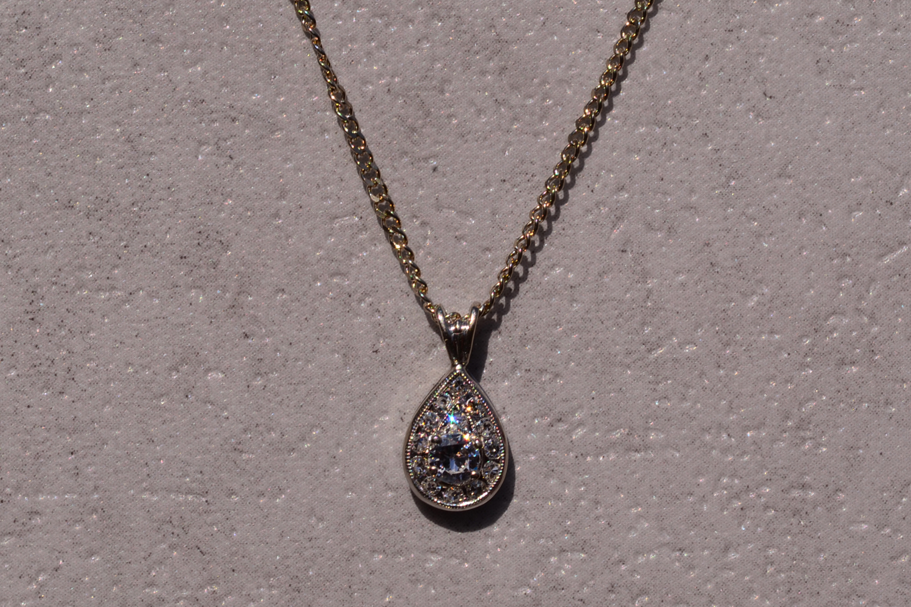 The 37th Street: Hollywood Glam Era Diamond Mystery Pendant in White Gold - Image 2