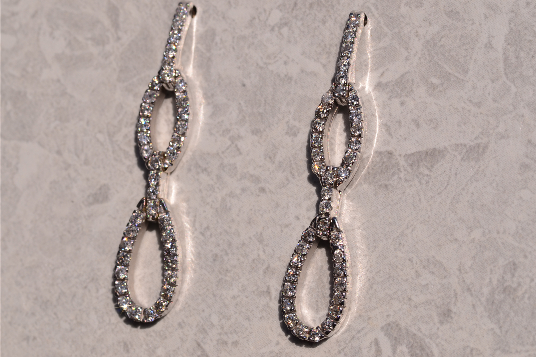 The 126th Street: Diamond Dangler Earrings in White Gold - Image 3