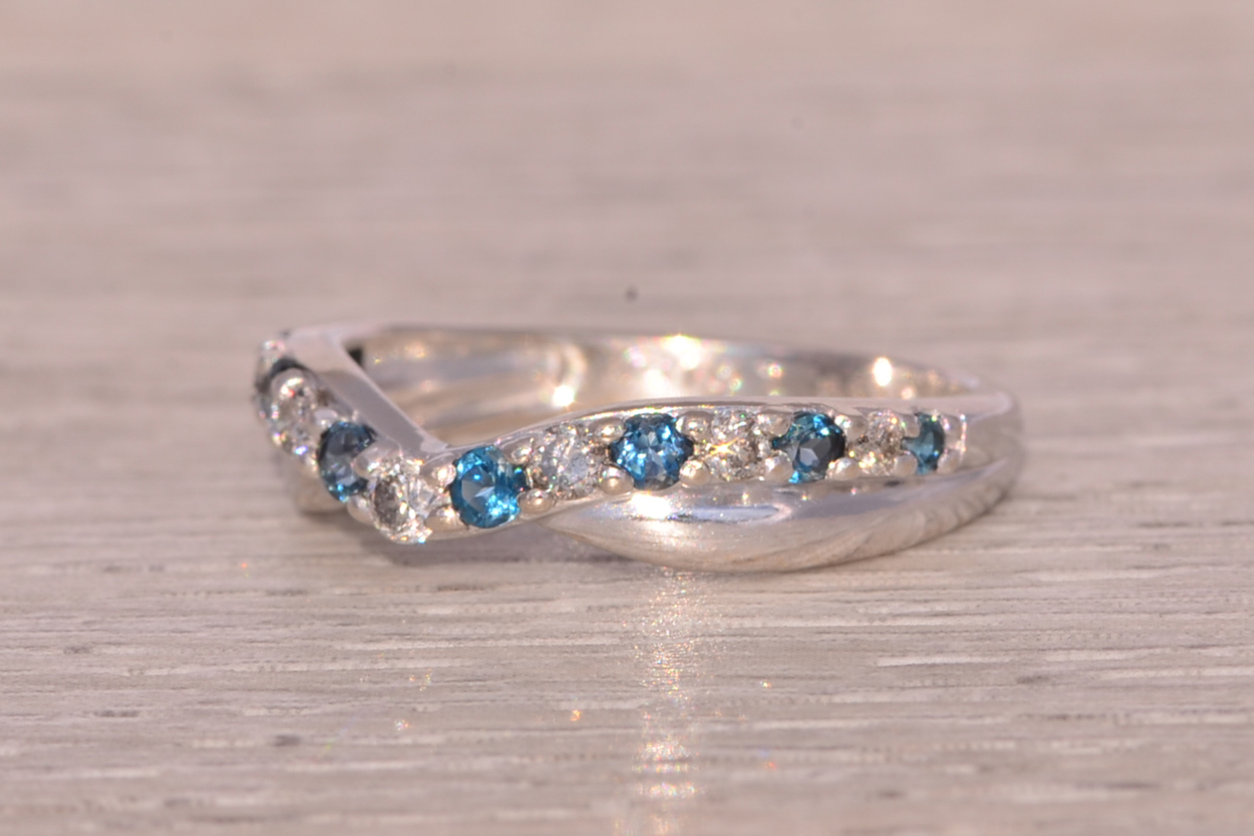 The Nebula Twist: Topaz and Diamond Ring in White Gold - Image 3