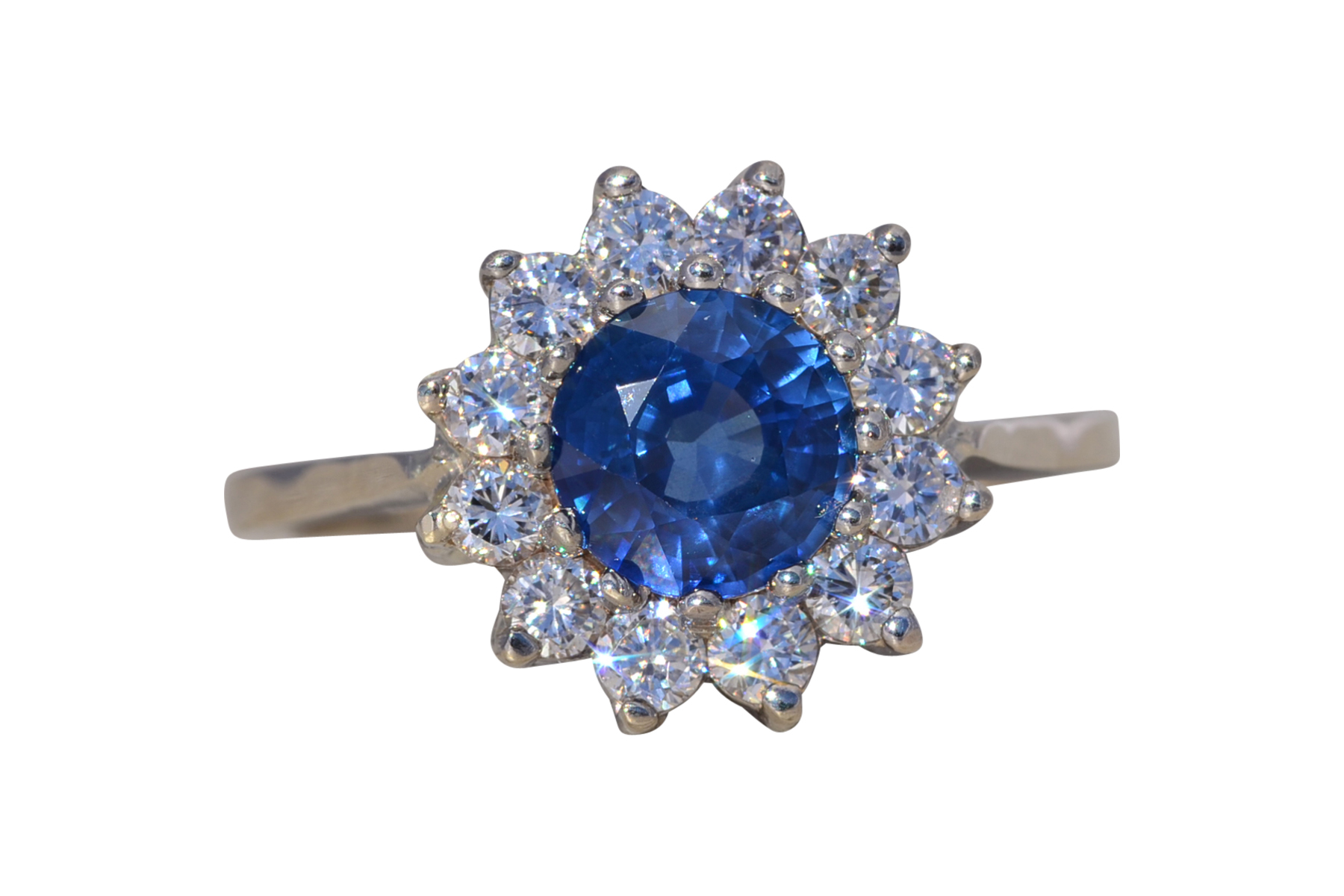 The Royal Bloom: Sapphire and Diamond Halo Ring in White Gold