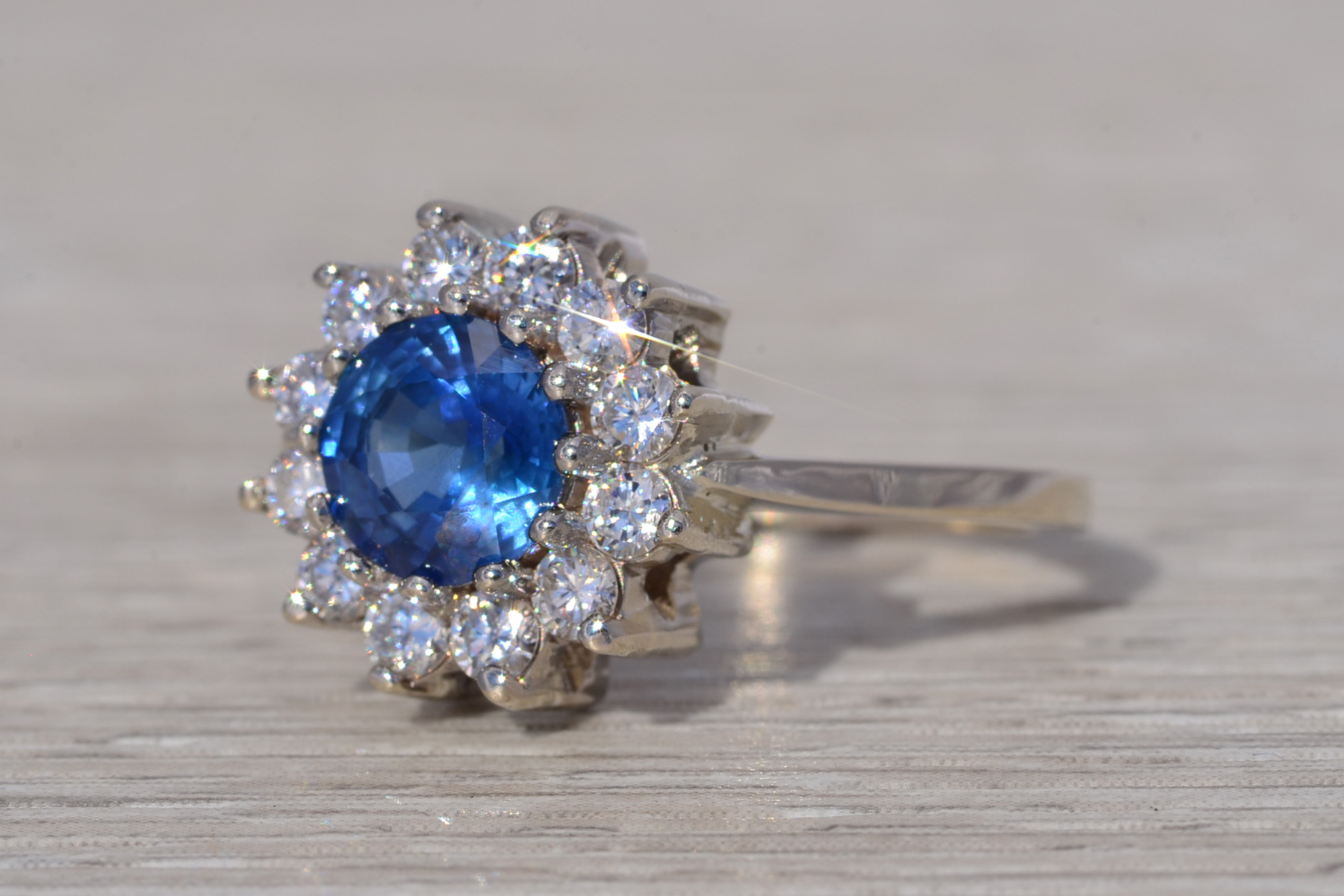 The Royal Bloom: Sapphire and Diamond Halo Ring in White Gold - Image 3