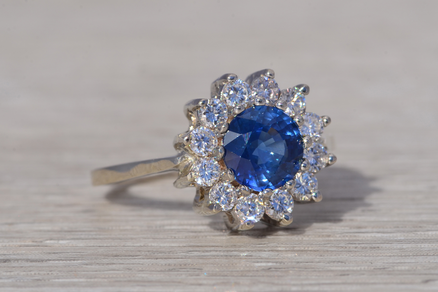 The Royal Bloom: Sapphire and Diamond Halo Ring in White Gold - Image 6