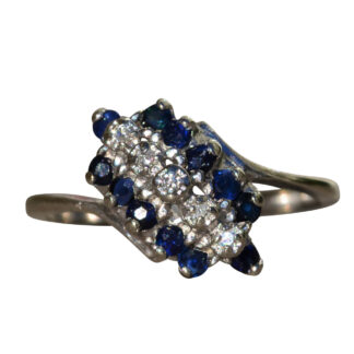 The Roscoe:  Ladies White Gold Bypass Style Cocktail Ring set with Diamonds and Sapphires