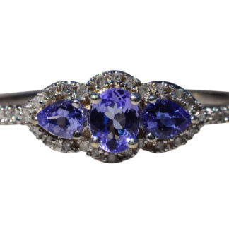 The Stomar:  Three Stone Tanzanite and Diamond Ring in White Gold