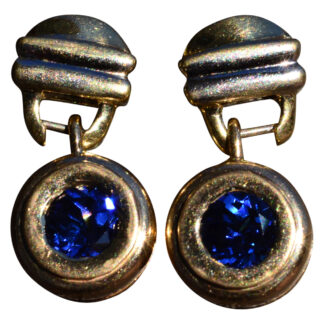 The Dixmonts:  Ladies 14K Yellow Gold Dangler Earrings set with Tanzanite