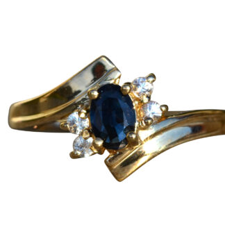 SOLD - The Tracy City:  Ladies Yellow Gold White and Blue Sapphire Bypass Style Ring