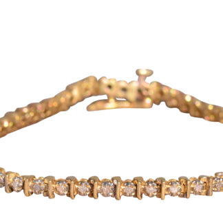 SOLD - The Puma:  Vintage Yellow Gold Tennis Bracelet with Diamonds