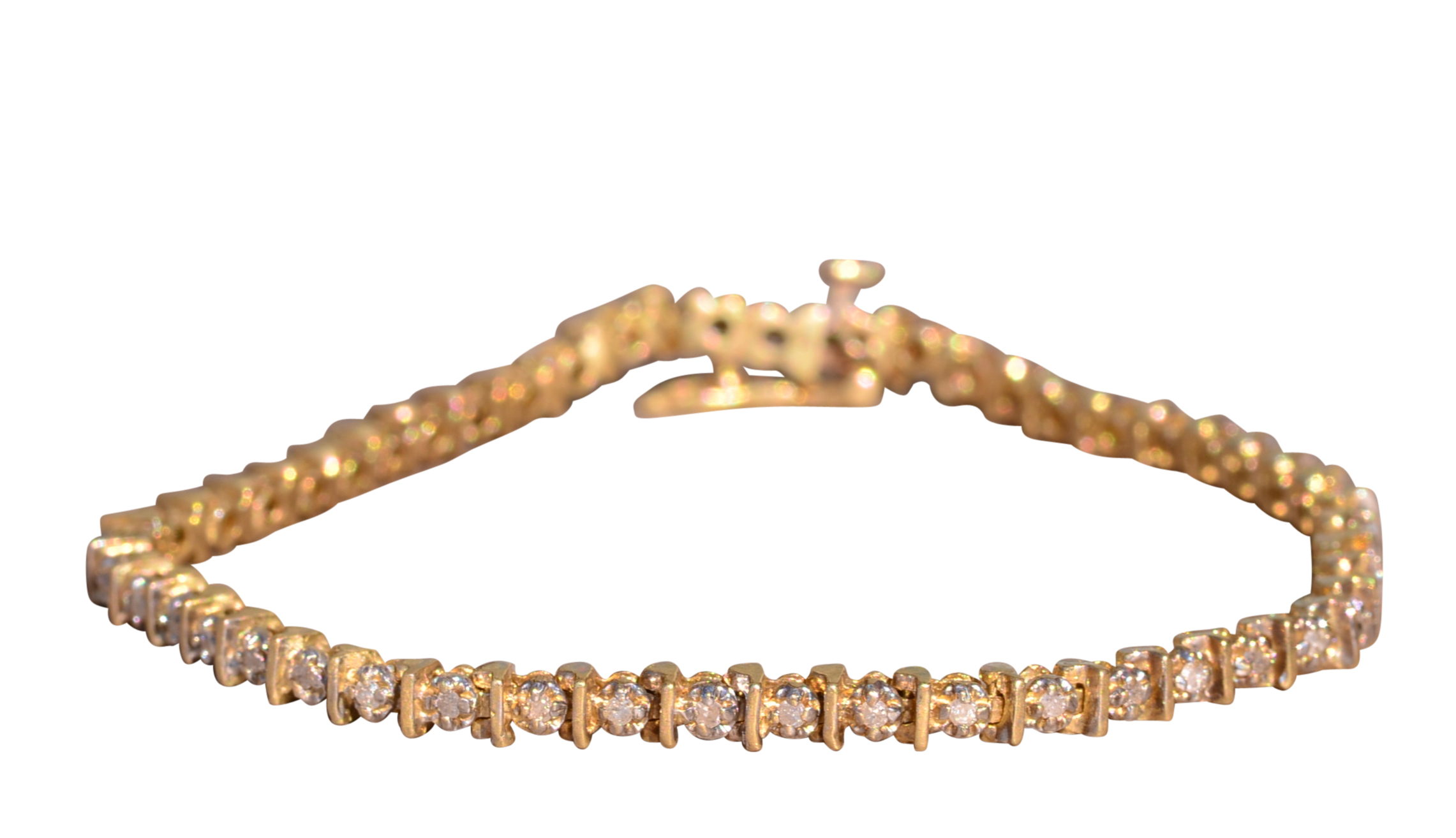 SOLD - The Puma: Vintage Yellow Gold Tennis Bracelet with Diamonds