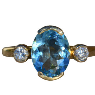 The Coulsdon:  Ladies 18K Yellow Gold 2 CTW Blue Topaz Ring set with Diamonds