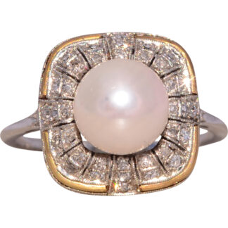 The Belle Époque Glow: Antique Pearl and Diamond Ring in Platinum