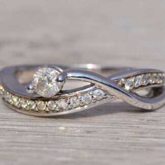 The Eternal Twist: Natural Diamond Ring in White Gold