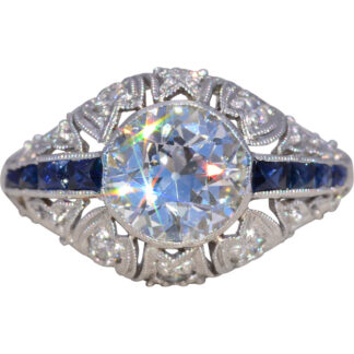 The Deco Radiance: Old European Cut Diamond and Sapphire Ring in Platinum