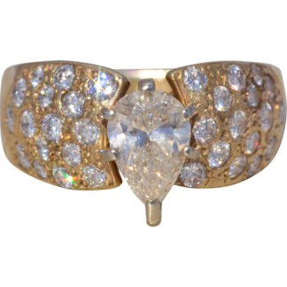 The Golden Cascade: Pear Natural Diamond Ring in Yellow Gold