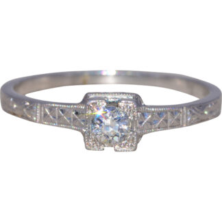 The Deco Star: Vintage Natural Diamond Engagement Ring in Platinum
