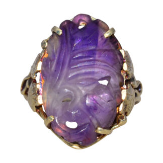The Violet Reliquary: Carved Amethyst Ring in Yellow Gold