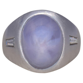 The Celestial Glow: Star Sapphire and Diamond Ring in White Gold