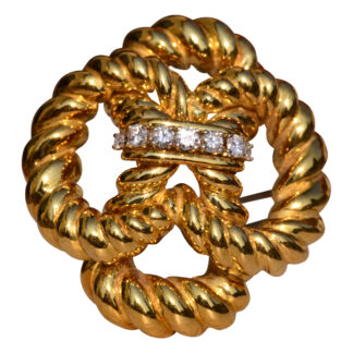 The East 69th:  Vintage Tiffany and Company Sailing Knot Brooch in Yellow Gold with Diamonds