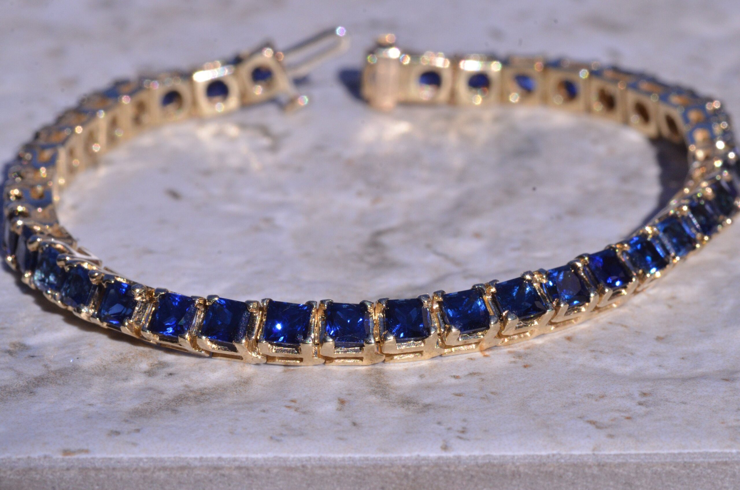 The Eloise: Radiant Cut Sapphire Yellow Gold Tennis Bracelet - Image 2