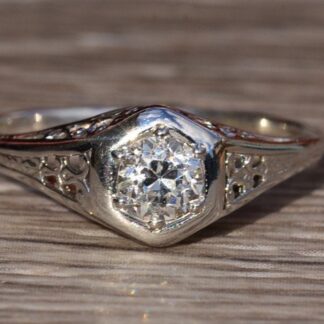 The Finterra:  18 Karat White Gold Filigree Engagement Ring set with 0.35 Carat Diamond