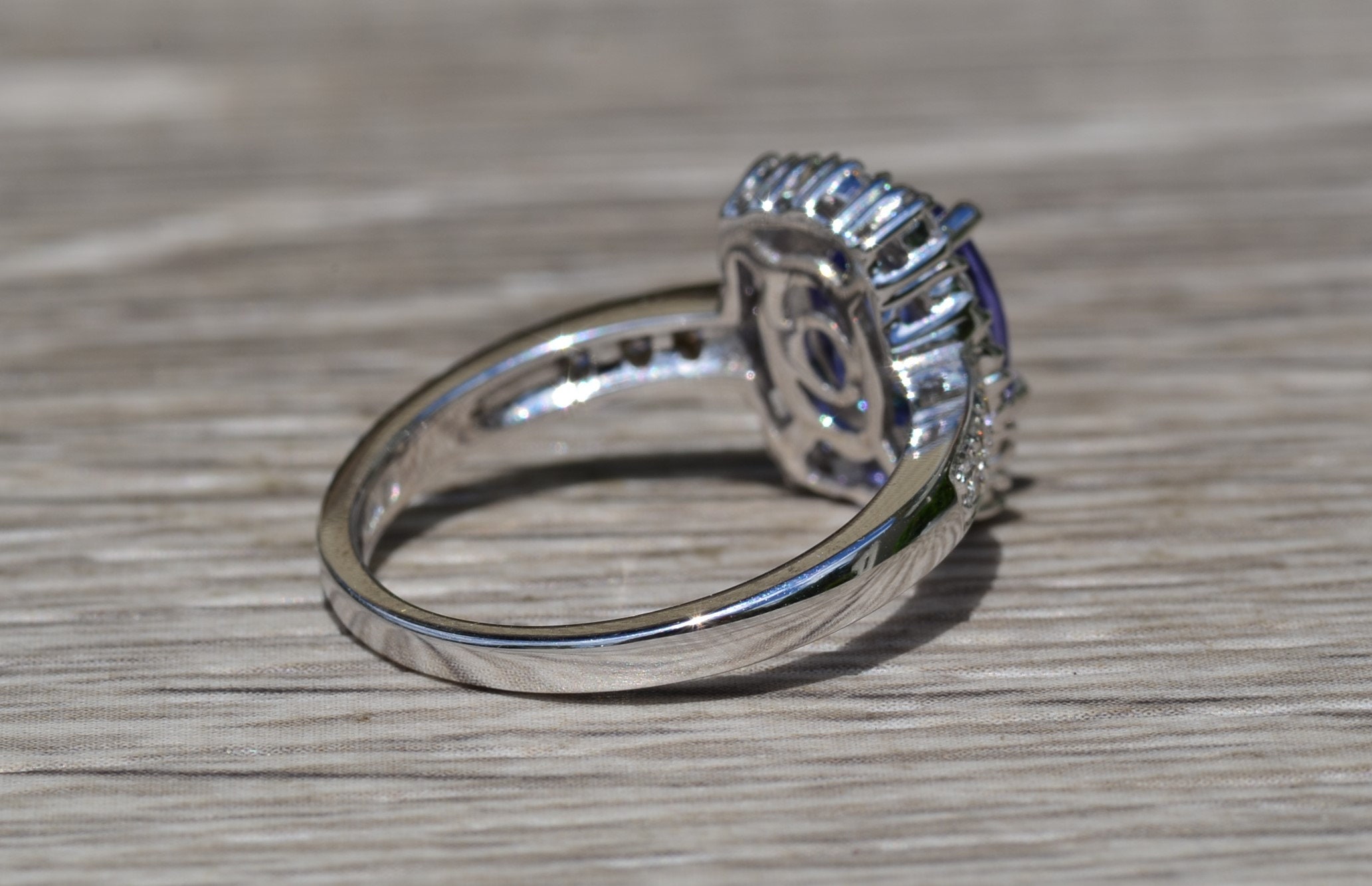SOLD - The Amapola: Ladies 18K White Gold Tanzanite and Diamond Halo Engagement Ring - Image 4