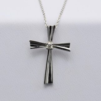 The Santo:  10 Karat White Gold Cross Pendant set with Diamond