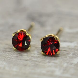 SOLD - The Remoras:  Ladies Garnet Stud Earrings in 14K Yellow Gold