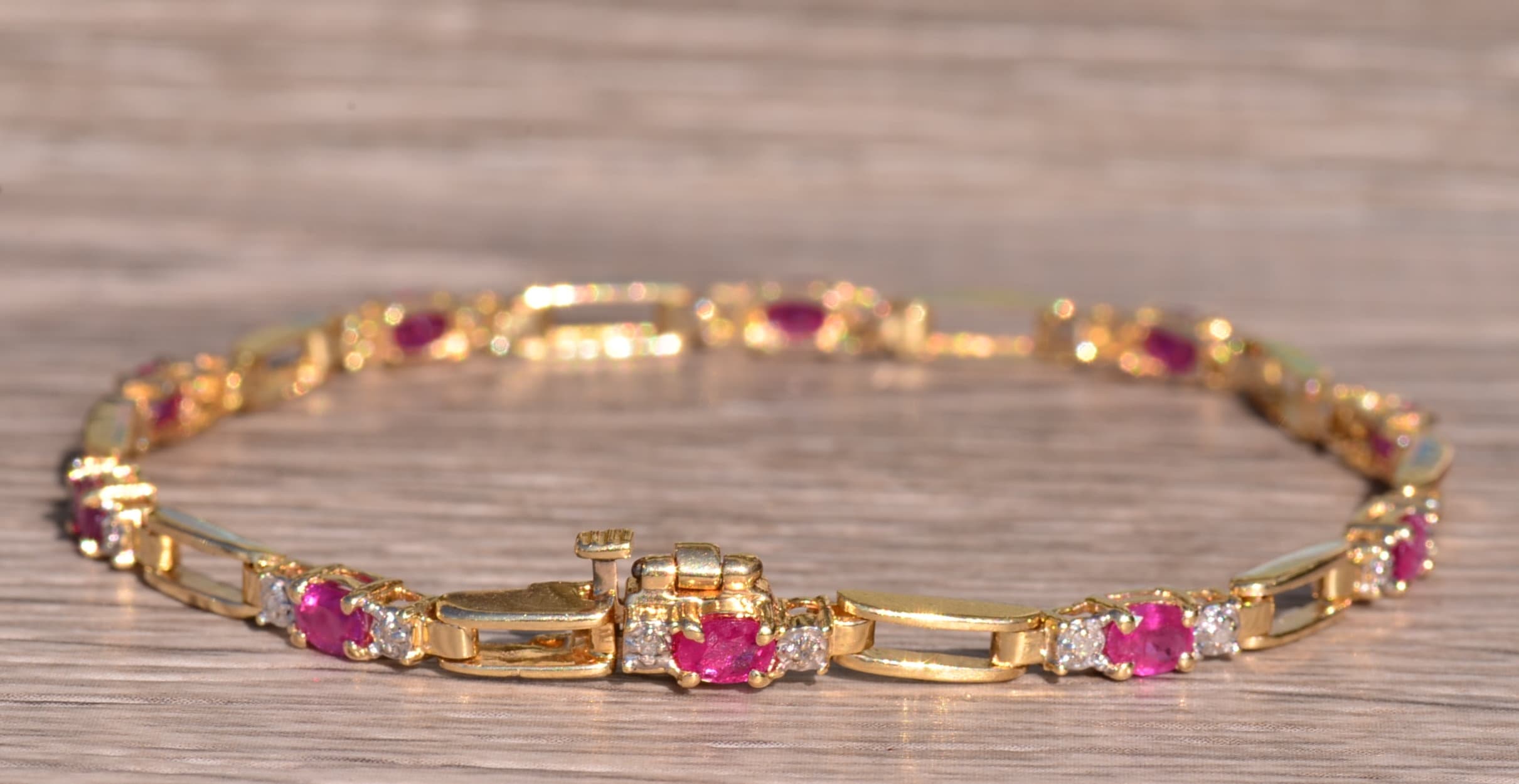 The Oceanside: Yellow Gold Ruby and Diamond Tennis Bracelet - Image 3