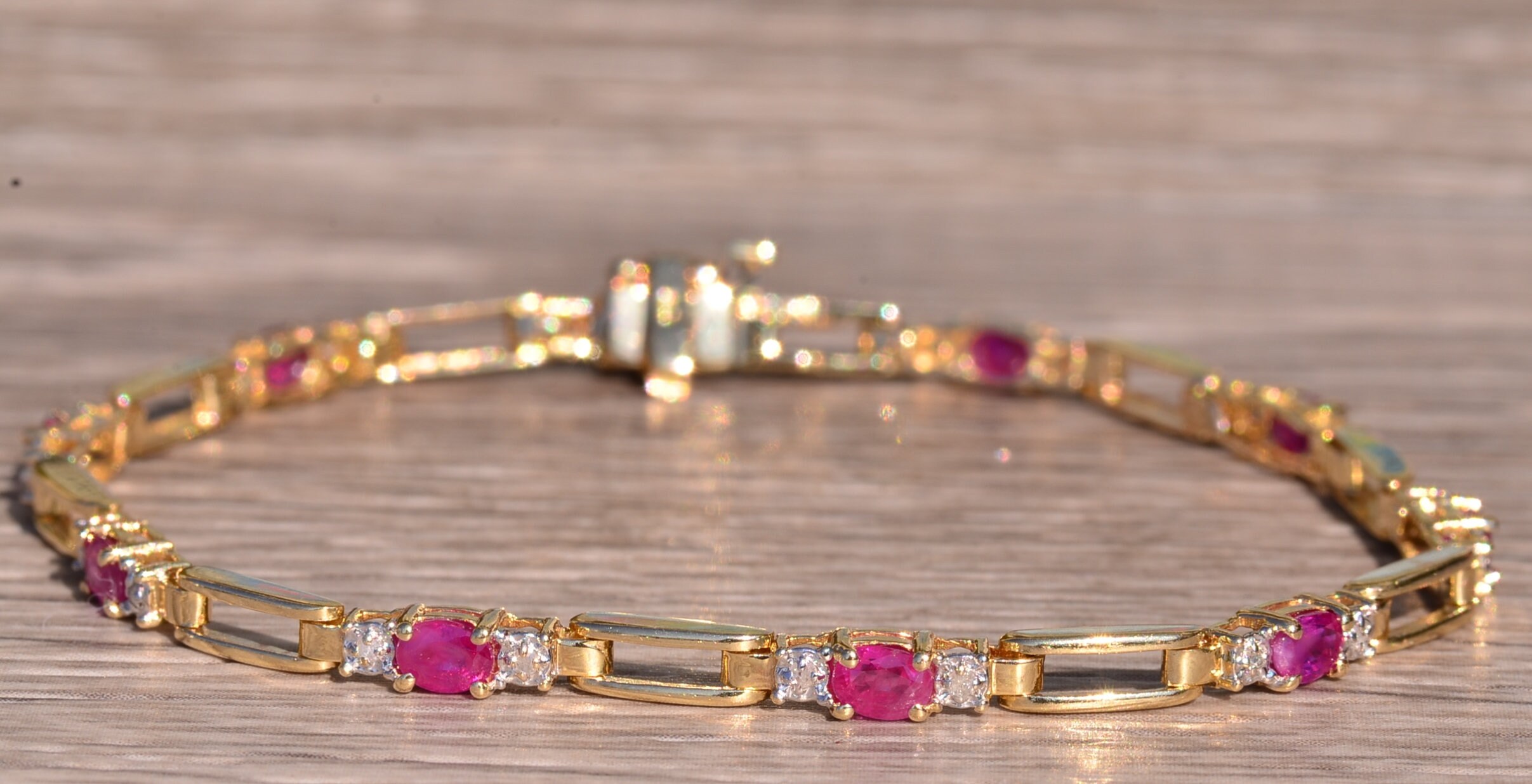 The Oceanside: Yellow Gold Ruby and Diamond Tennis Bracelet - Image 2